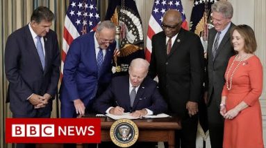 US President Joe Biden indicators climate, tax and properly being bill into legislation – BBC Files